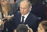 Ruský prezident Vladimir Putin s novináři.