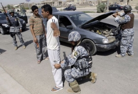 Zvýšená bezpečnost v ulicích Bagdádu při návštěvě Obamy.