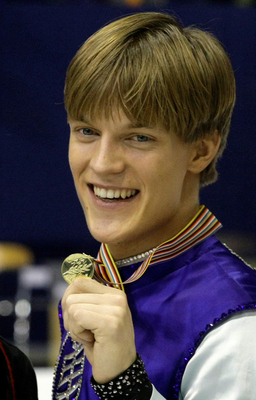 Krasobruslař Tomáš Verner se zlatou medailí.
