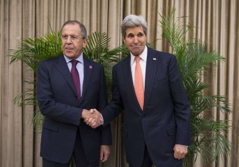 Sergej Lavrov a John Kerry.