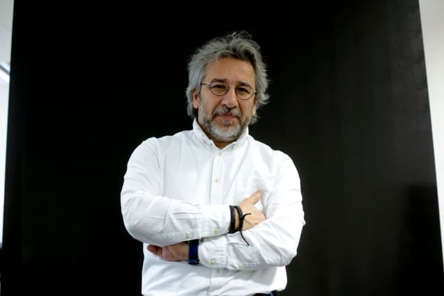 Novinář Can Dündar.