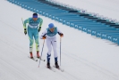 Alexej Poltoranin (vlevo) během olympijského závodu v roce 2018.