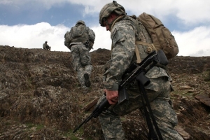 Vojáci v Afghánistánu. Obama jim chce poslat masivní posily.